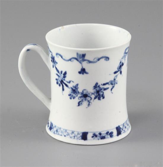 A very rare Worcester blue and white Floral Swag, Ribbon and Scroll pattern coffee can, c.1755, two rim chips with short hairline crack